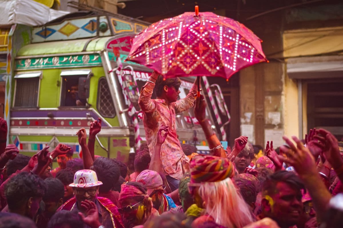 Crowd celebrating Holi with colour